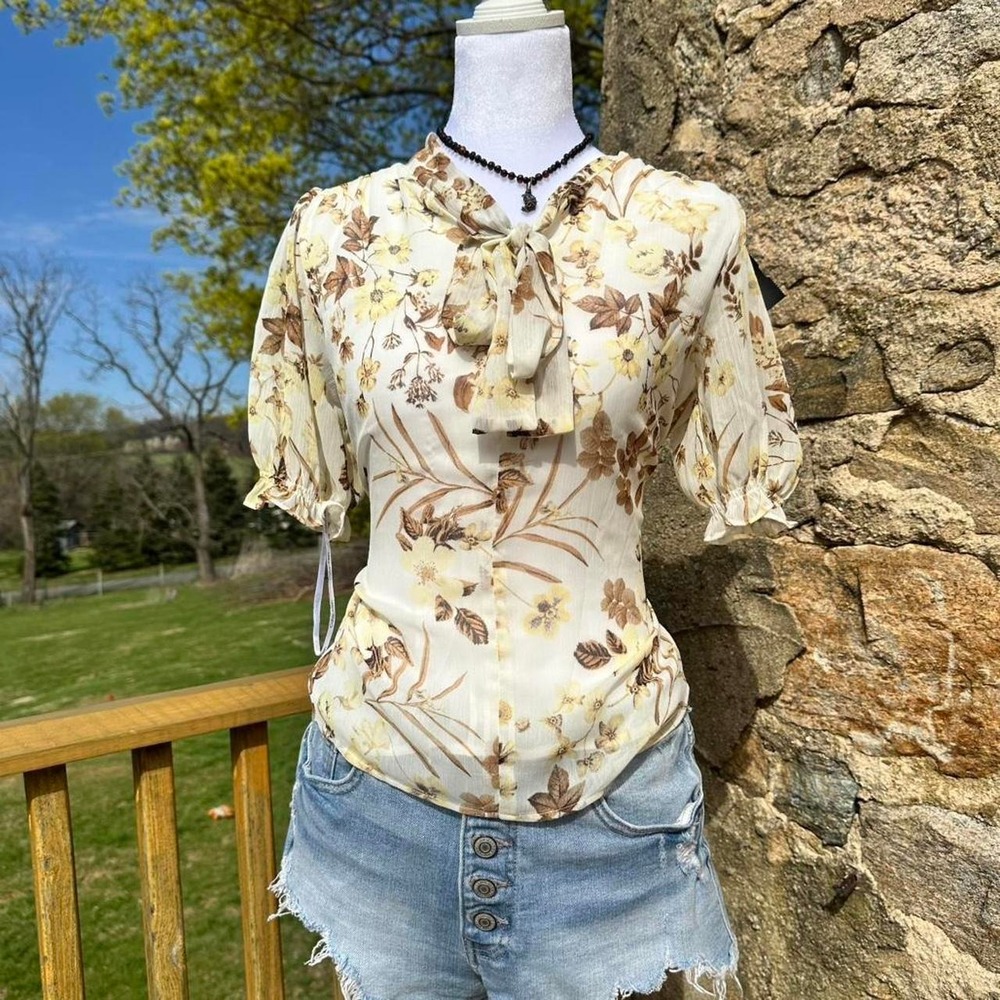 Floral Calvin Klein top with tie neck detail